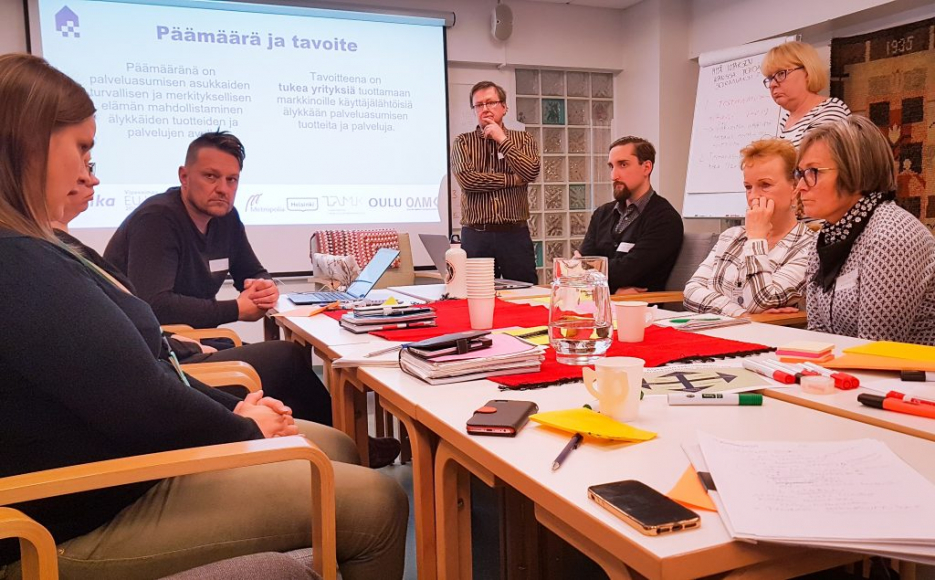 Group of people discussing at a table