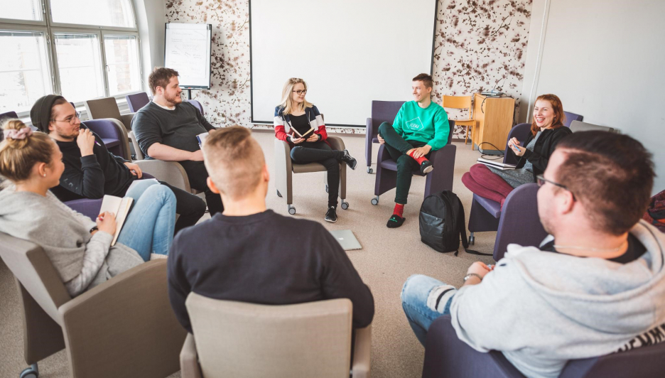 People discussing in a circle